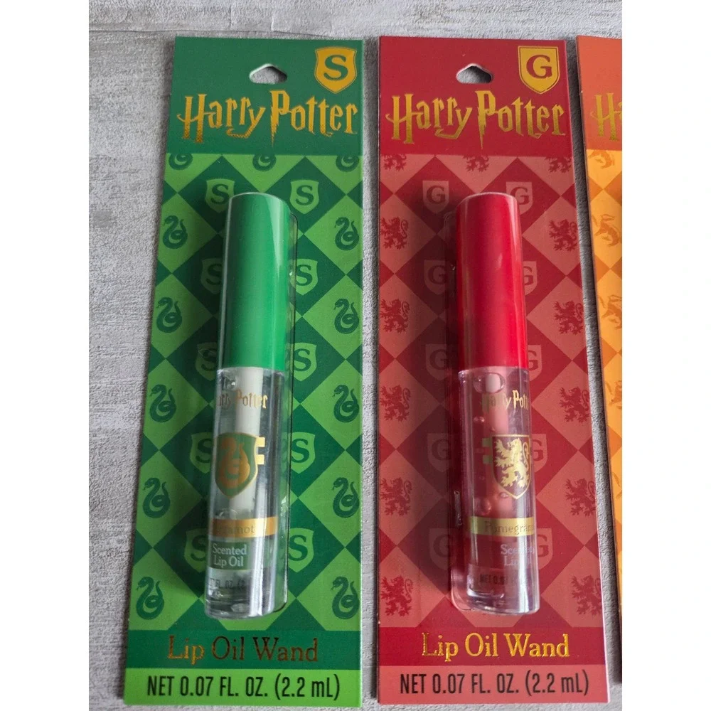 Harry Potter Lip Oil Wand Set 4 Pack Hogwarts Houses Scented Gloss New